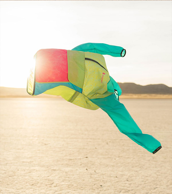 Cotopaxi Windbreaker blowing in the wind.